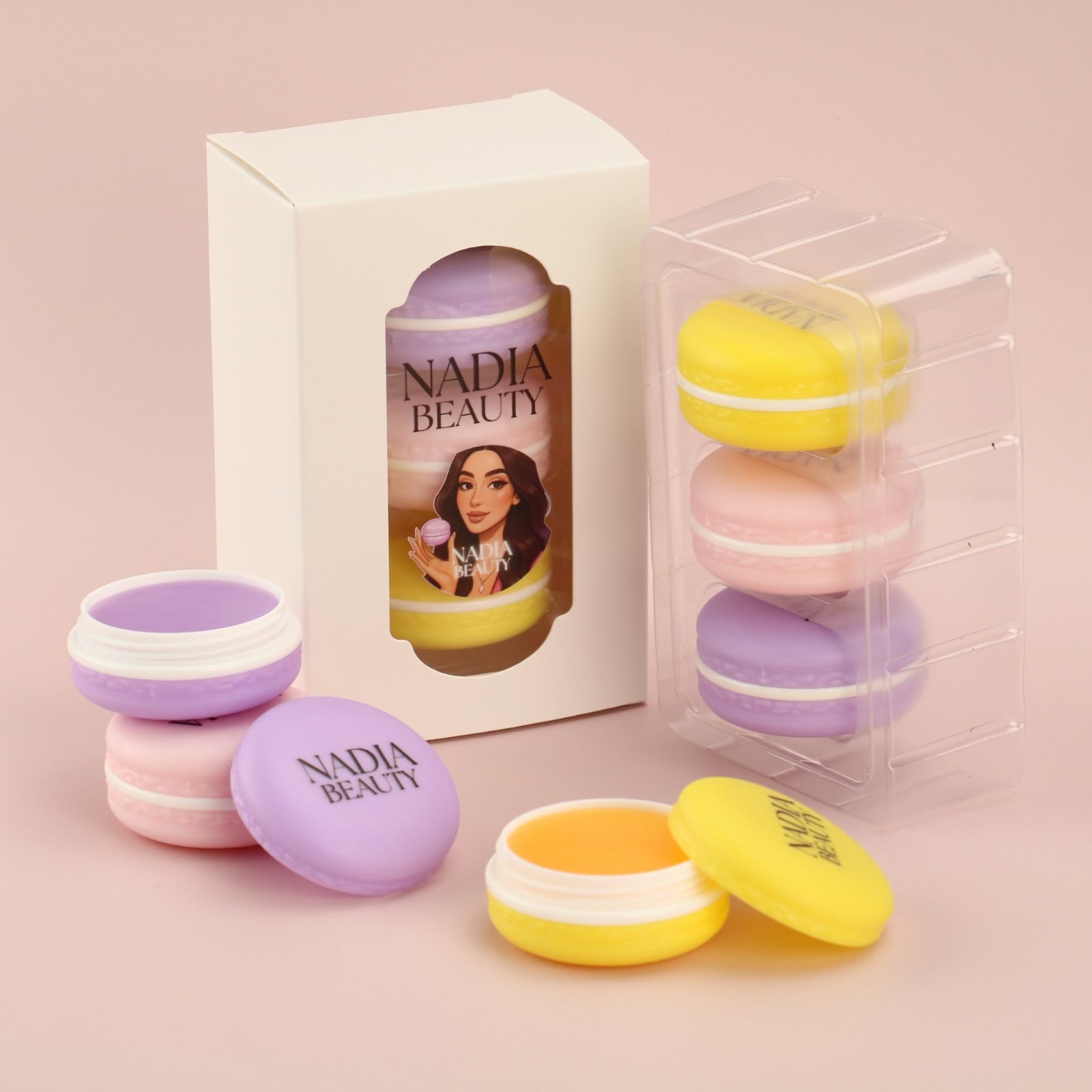 Colorful lip balm containers with 'Nadia Beauty' branding on a pink background